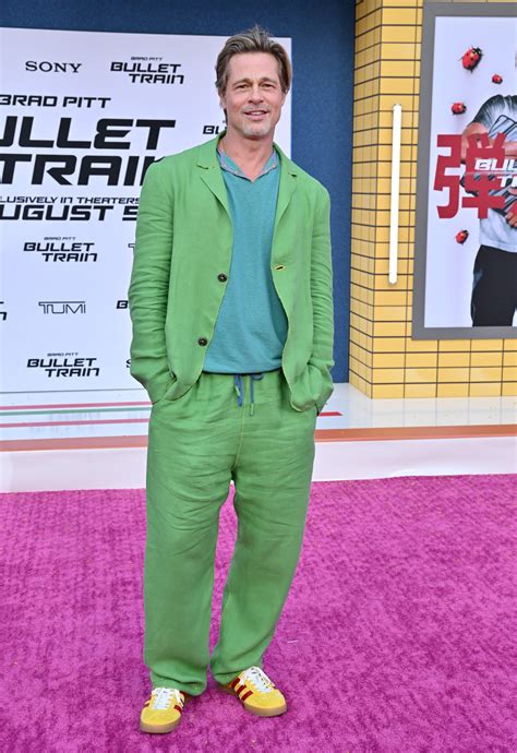 brad pitts latest red carpet  breaks   rules british vogue