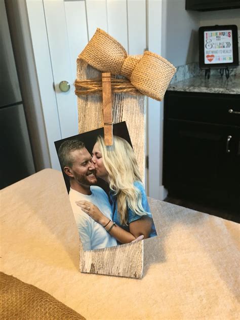 rustic bridal shower made these photo holders from old wood dowel twine burlap ribbon and a