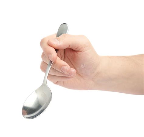 male hand holding  empty spoon stock photo image  occupation