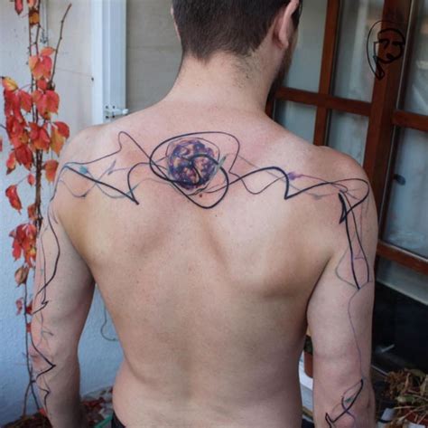 Abstract Style Creative Colored Upper Back And Sleeve Tattoo Of Various