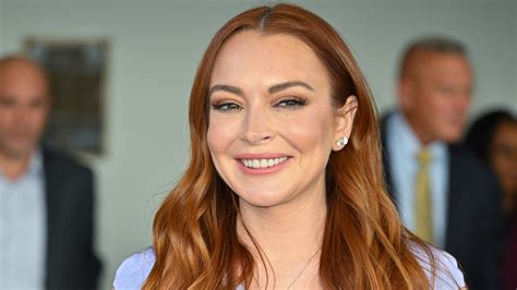 Lindsay Lohan Is A Winter Princess With Red Ringlets And A Hot Pink Lip