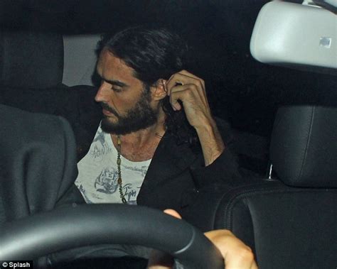 russell brand looks deep into geri halliwell s eyes as he bids her farewell while leaving her