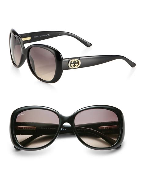 lyst gucci logo butterfly sunglasses in black