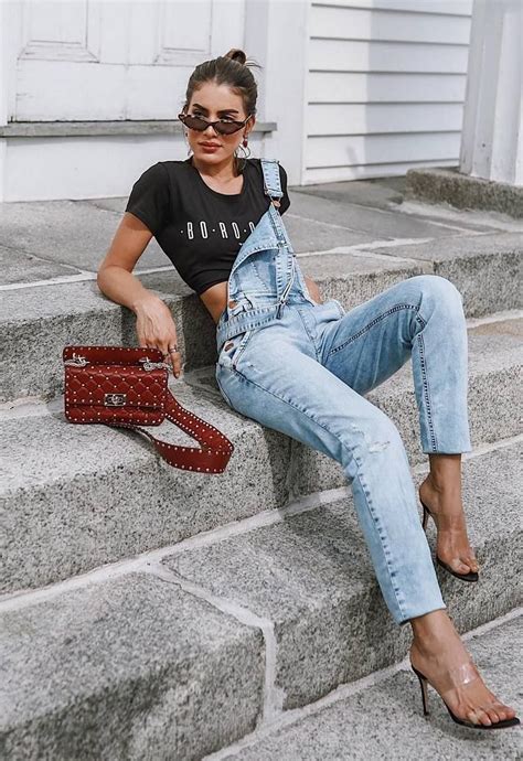 what to wear with a denim jumpsuit black t shirt red bag heels fashion fashion outfits