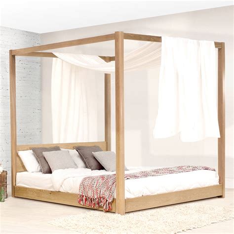 wooden  poster bed frame   laid beds