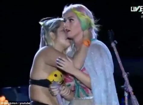 katy perry is kissed and groped by a fan on stage during