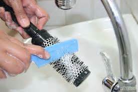 clean hairbrushes  combs   head lice outbreak head