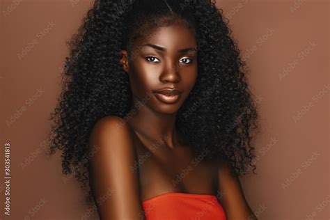 African Beautiful Woman Portrait Brunette Curly Haired Young Model