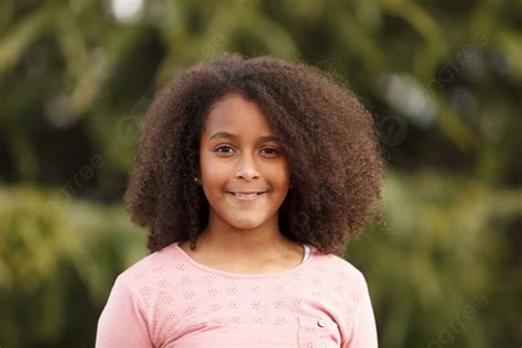 Cute African American Girl In The Street With Afro Hair Cute African
