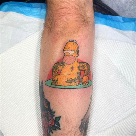 Homer Simpson Tattoo Located On The Forearm