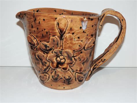 hand thrown larger ceramic pitcher wood  glaze  black