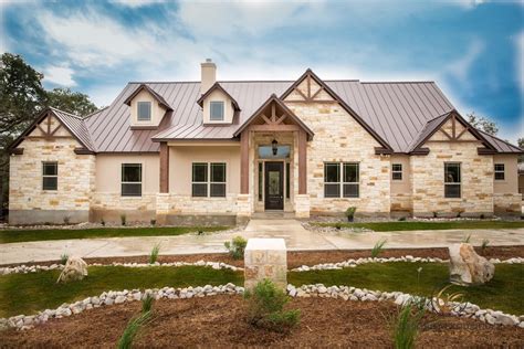 hill country model home rustic exterior austin  kurk homes