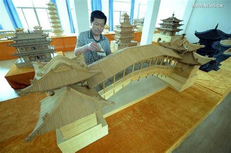 man standing    wooden model   bridge