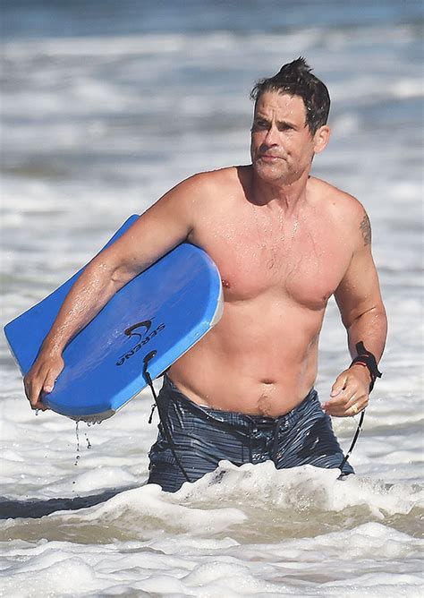 rob lowe goes shirtless boogie boarding with hunky son matthew
