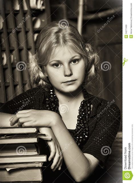 teen girl in retro style with a stack of books stock image image 34271469