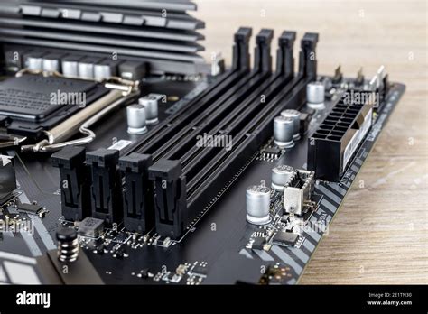 slots  ddr ram memory modules   modern black pc motherboard computer mainboard