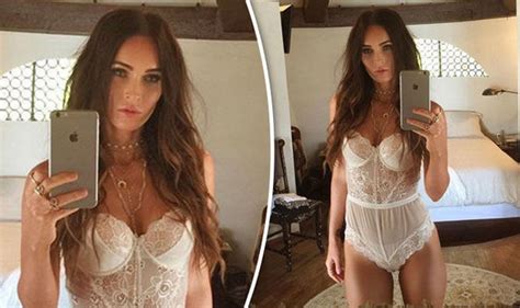 megan fox strips down to sexy lace lingerie for sultry