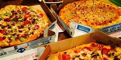 dominos pizza uk  compra il franchisee madev evolving retail