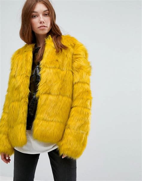 bershka faux fur jacket gigi hadid yellow furry coat popsugar fashion photo