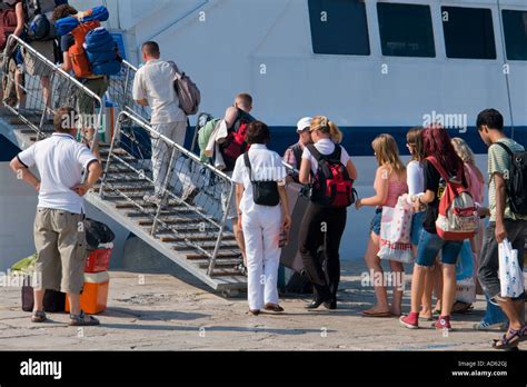 tourists boarding ship stock photo alamy