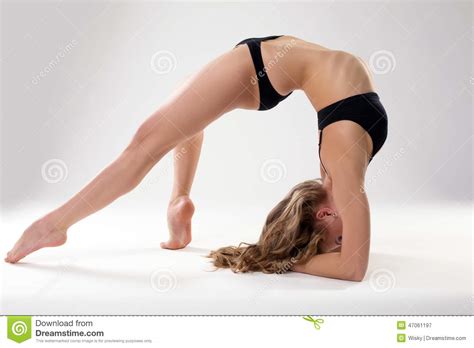 Image Of Flexible Woman Doing Pilates Exercises Stock