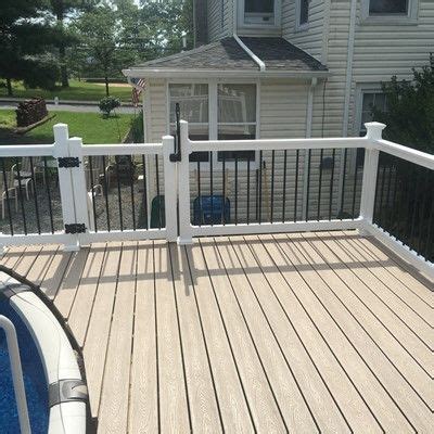trex pool deck  white vinyl railing   decks