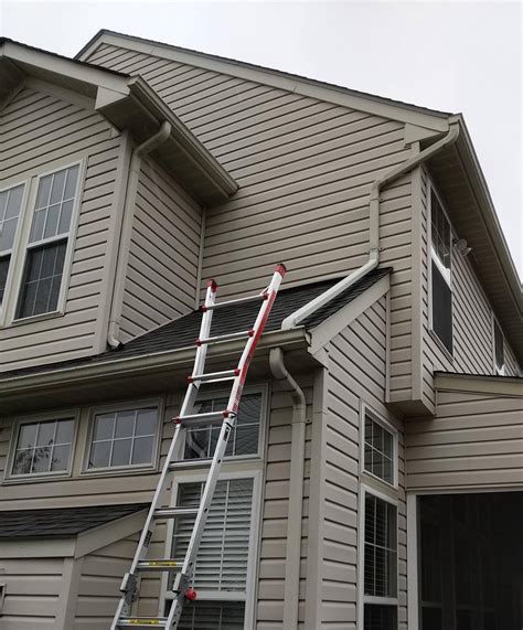how to put up gutters and downspouts arrow renovation before after