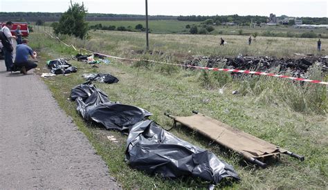 Mh17 Bodies Mh17 Passenger S Body Crashed Through A House Youtube