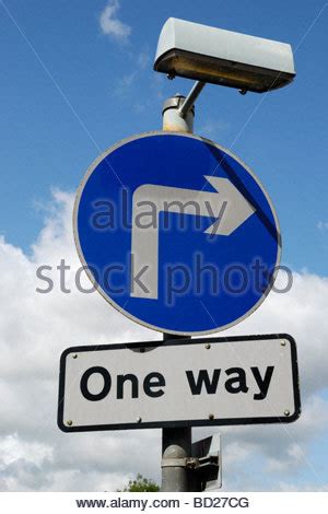 uk road sign   street traffic streets white arrow blue stock photo royalty  image
