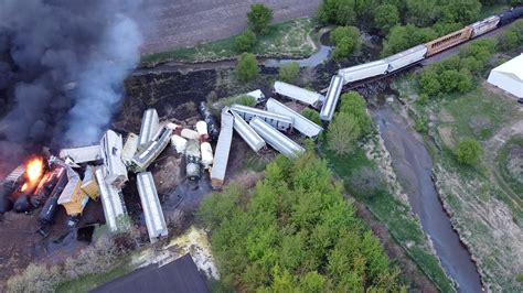 train  iowa hauling hazardous materials derails catches fire reuters