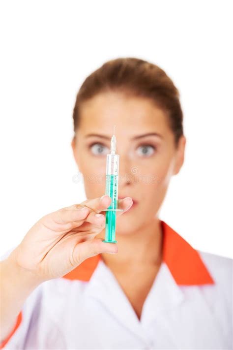 Female Nurse Or Doctor With A Syringe In Hand Stock Image Image Of