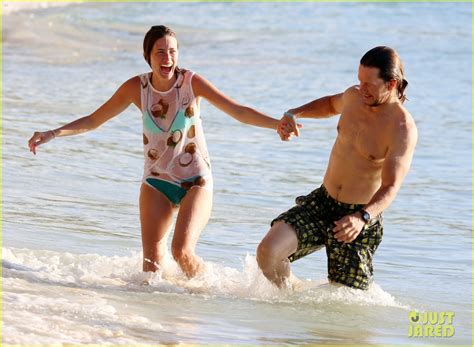 mark wahlberg and wife rhea durham show some pda on their tropical