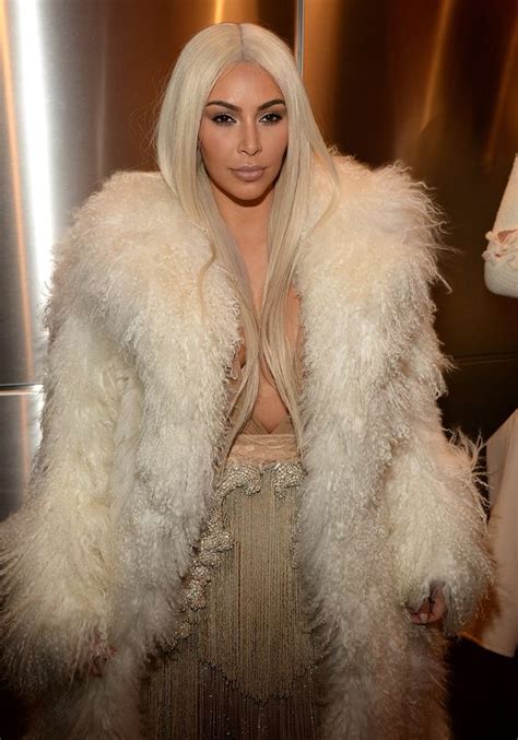 kris jenner rocks giant fur coat for paris fashion week as she takes
