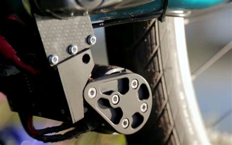 add  tiny electric bike motor attaches  frame gearjunkie