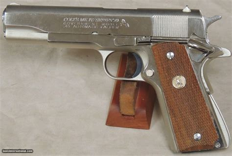colt  nickel finish government model  acp caliber mkiv series  pistol sn bxx