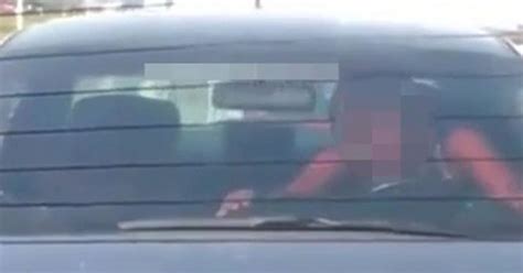 woman caught having sex behind wheel of moving car on motorway and she doesn t stop at a red
