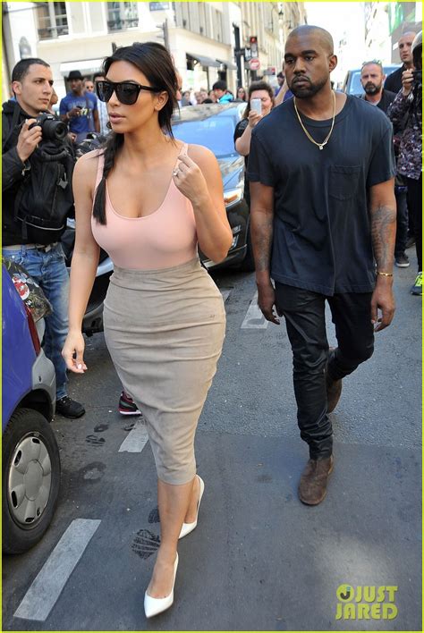 kim kardashian flaunt her assets in form fitting outfit in paris photo