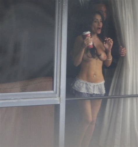neighbor with great tits showing off in the hotel window voyeur publicnudity creeping by