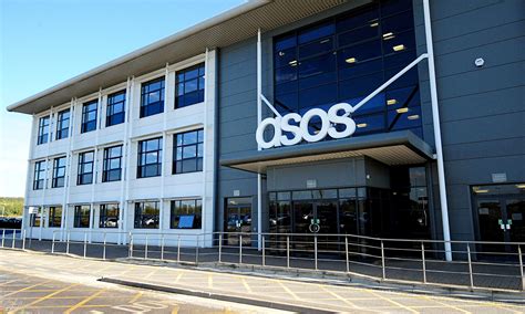 asos warehouse fire  south yorkshire leads company  halt sales business  guardian