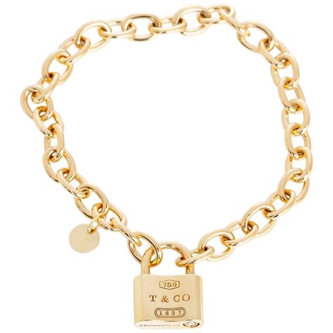 tiffany   gold  padlock charm chain link bracelet  stdibs