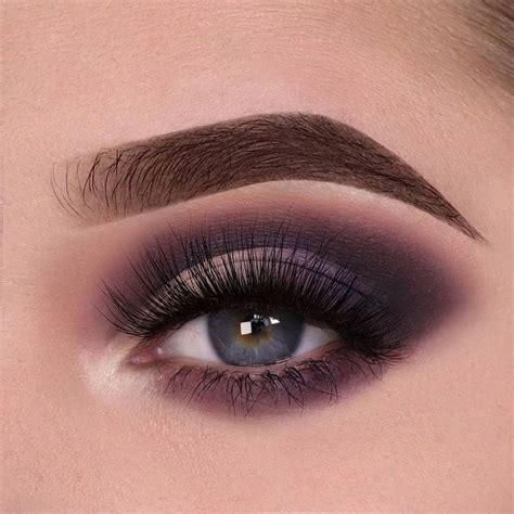 a cool toned smokey eye using poetry pitch black