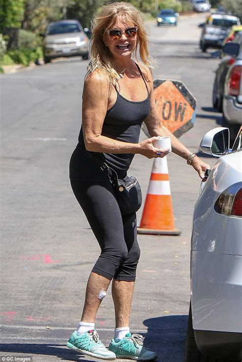 goldie hawn flashes a smile as she shows off her sporty style in