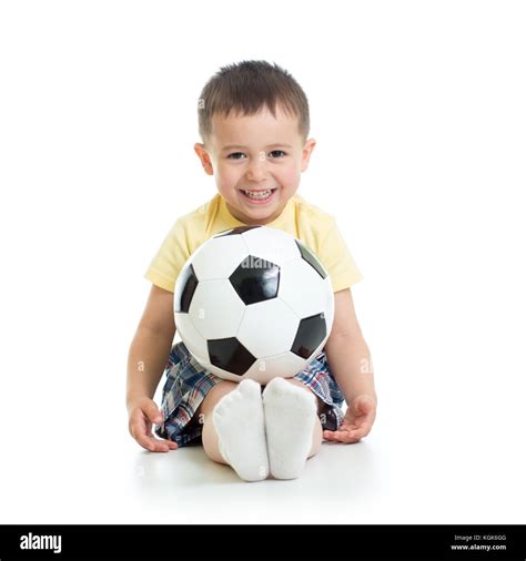 boy holding soccer ball   res stock photography  images alamy