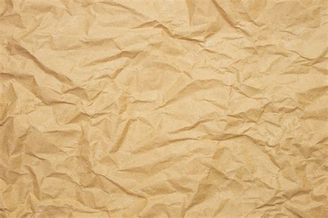 premium photo wrinkled brown paper background kraft paper texture