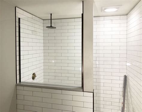 White Subway Tiled Shower Calls For Beautiful Glass
