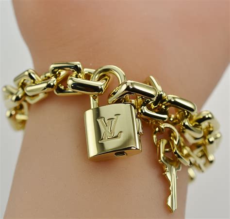 louis vuitton solid  gold charm bracelet  purse charm  ounces solid  gold