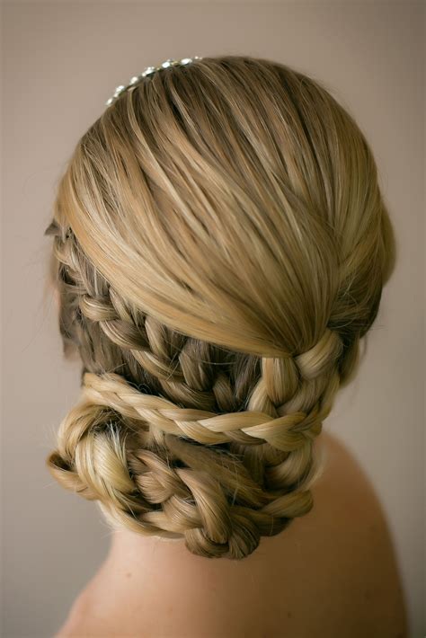 womans head  blonde hair  braids