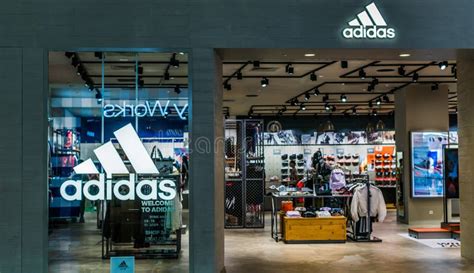 front entrance  adidas store  singapore shopping mall editorial photo image  logo