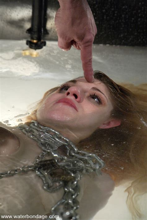 sexy bodied slave blonde tawni ryden gets unwrapped before water bondage