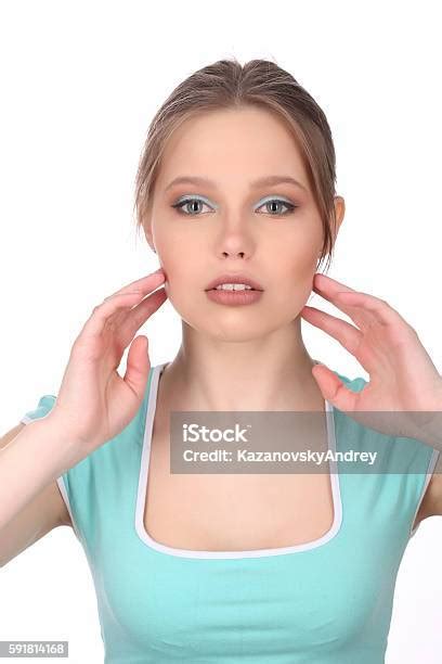 girl with makeup touching her cheekbones close up white background